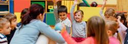 Preschool children sitting in a circle