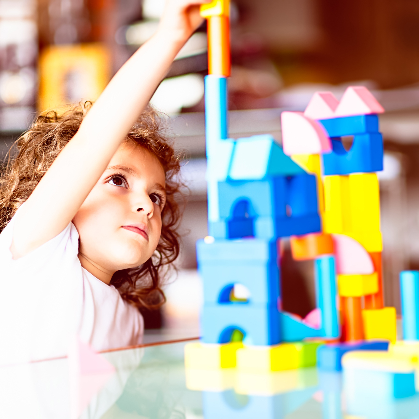 Expand Your Public Policy Knowledge child playing with blocks